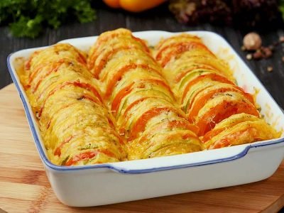 Кабачки, запеченные с помидорами