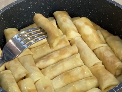 Томленые налистники с творогом по-одесски